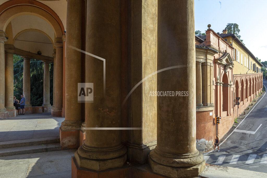 Guido Calamosca A view of the porticoes in Bologna, Italy, Wednesday, July 28, 2021. Bologna's 12th-century porticoes, still part of the city's everyday life, have been added to the World Heritage List. At a meeting in China on Wednesday, the World Heritage Committee of UNESCO, the U.N. culture agency, inscribed the porticoes on the prestigious list. The addition raises to 58 the number of Italian sites on the list. (Guido Calamosca/LaPresse via AP)