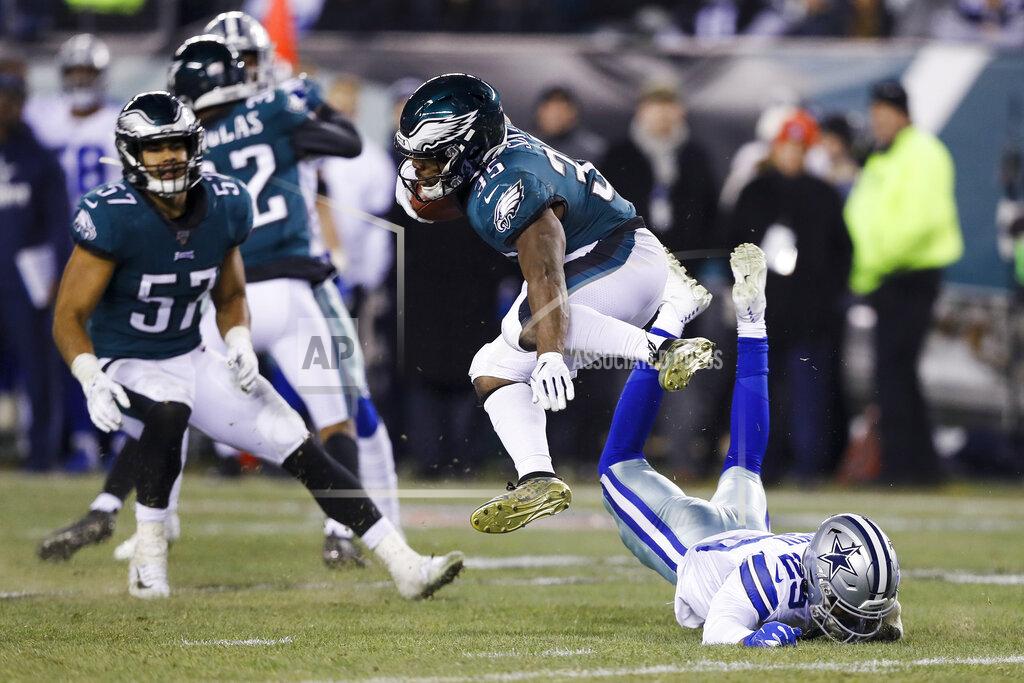 Michael Perez Philadelphia Eagles' Boston Scott (35) jumps over Dallas Cowboys' C.J. Goodwin during the second half of an NFL football game Sunday, Dec. 22, 2019, in Philadelphia. (AP Photo/Michael Perez)