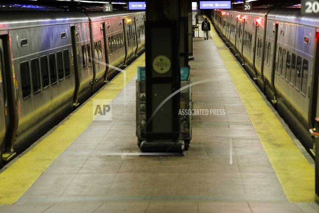 Frank Franklin Ii A commuter walks along a train platform at Grand Central Terminal Wednesday, April 29, 2020, in New York. The state continued a trend of daily fatalities decreasing slowly over the past three weeks. “The decline has been slow at best and still disgustingly high,” Gov. Andrew Cuomo said Wednesday at his daily briefing. (AP Photo/Frank Franklin II)