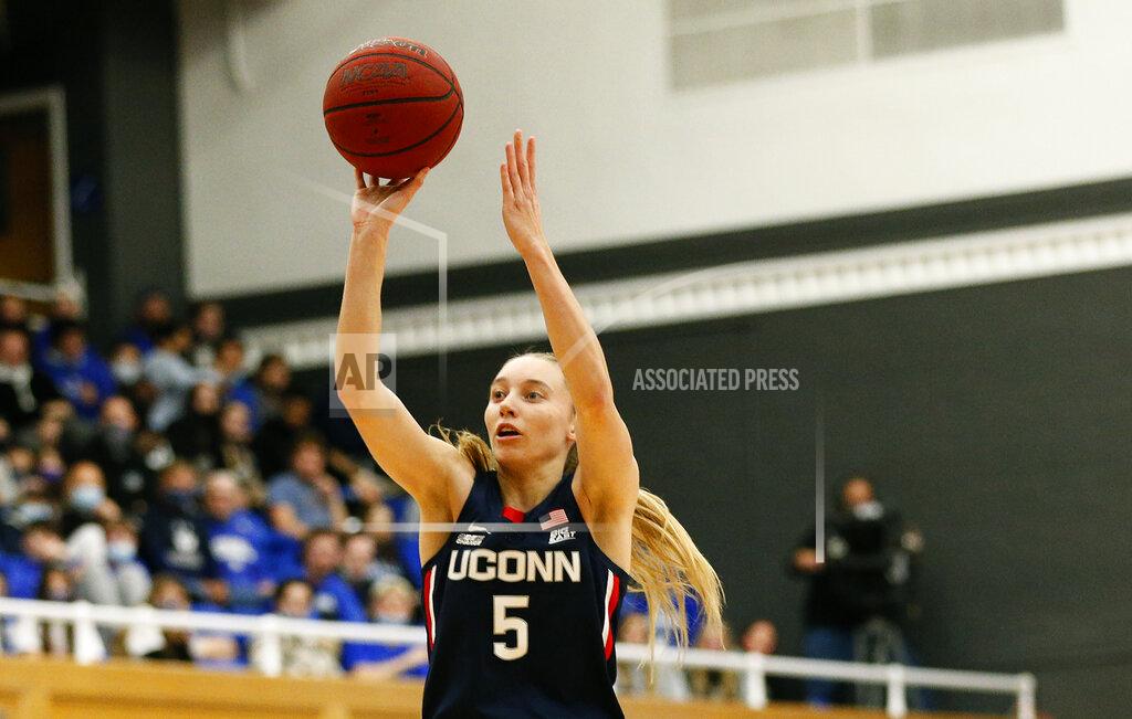 Noah K. Murray Connecticut guard Paige Bueckers (5) shoots against Seton Hall during the second half of an NCAA college basketball game on Friday, Dec. 3, 2021, in South Orange, N.J. (AP Photo/Noah K. Murray)