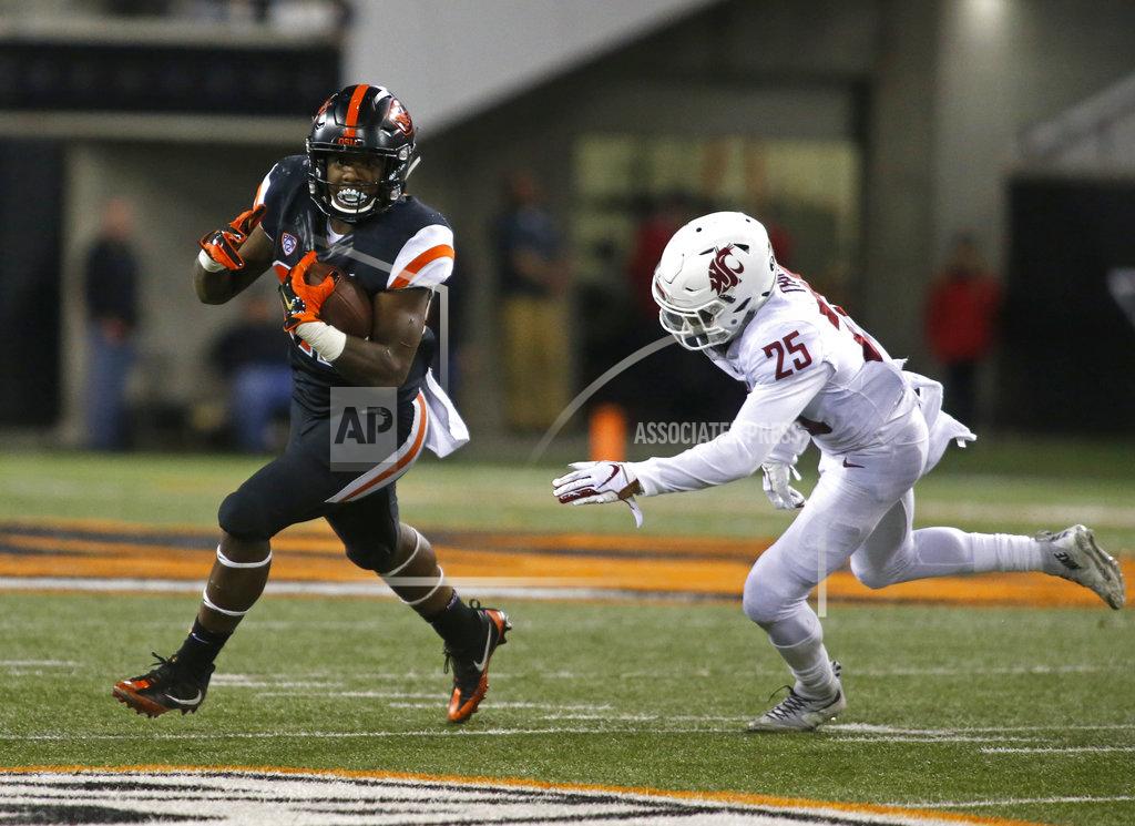 Timothy J. Gonzalez Oregon State running back Jermar Jefferson (22) pulls away from Washington State's Skyler Thomas (25) during the second half of an NCAA college football in Corvallis, Ore., Saturday, Oct. 6, 2018. (AP Photo/Timothy J. Gonzalez)