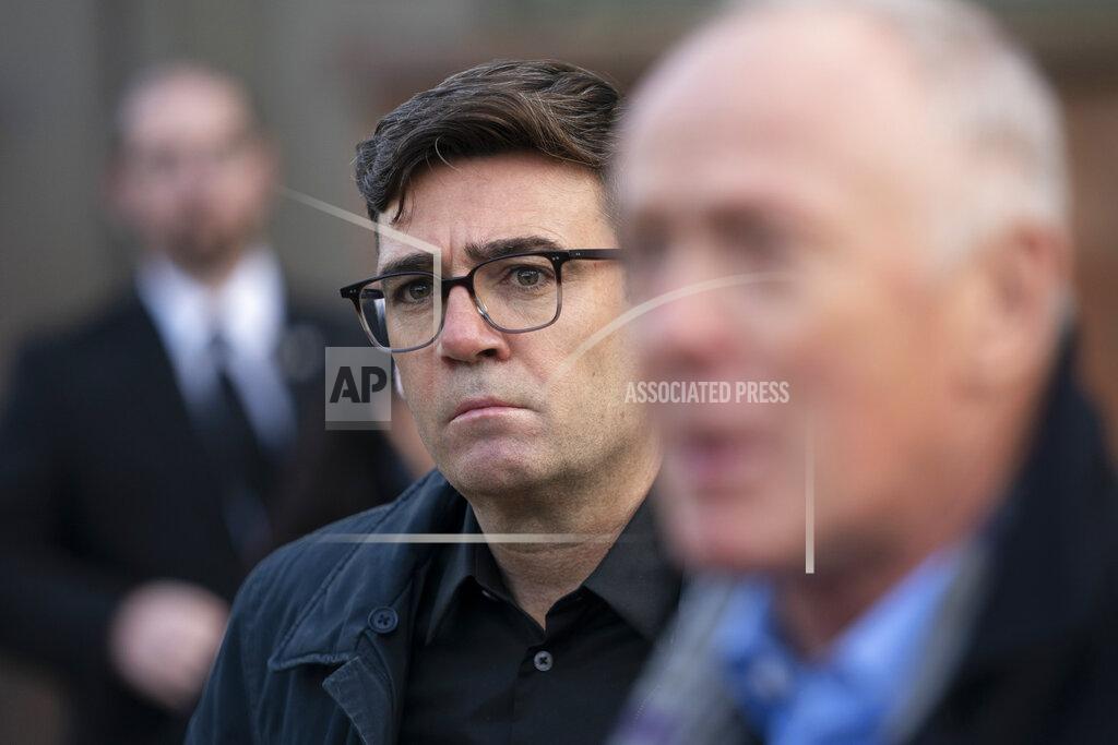 Greater Manchester mayor Andy Burnham looks on, outside Bridgewater Hall, following last-ditch talks with the Prime Minister aimed at securing additional financial support for his consent on new coronavirus restrictions, in Manchester, England, Tuesday, Oct. 20, 2020. The British government appeared poised Tuesday to impose strict coronavirus restrictions on England's second-largest city after talks with officials in Greater Manchester failed to reach an agreement on financial support for people whose livelihoods will be hit by the new measures (AP Photo/Jon Super)