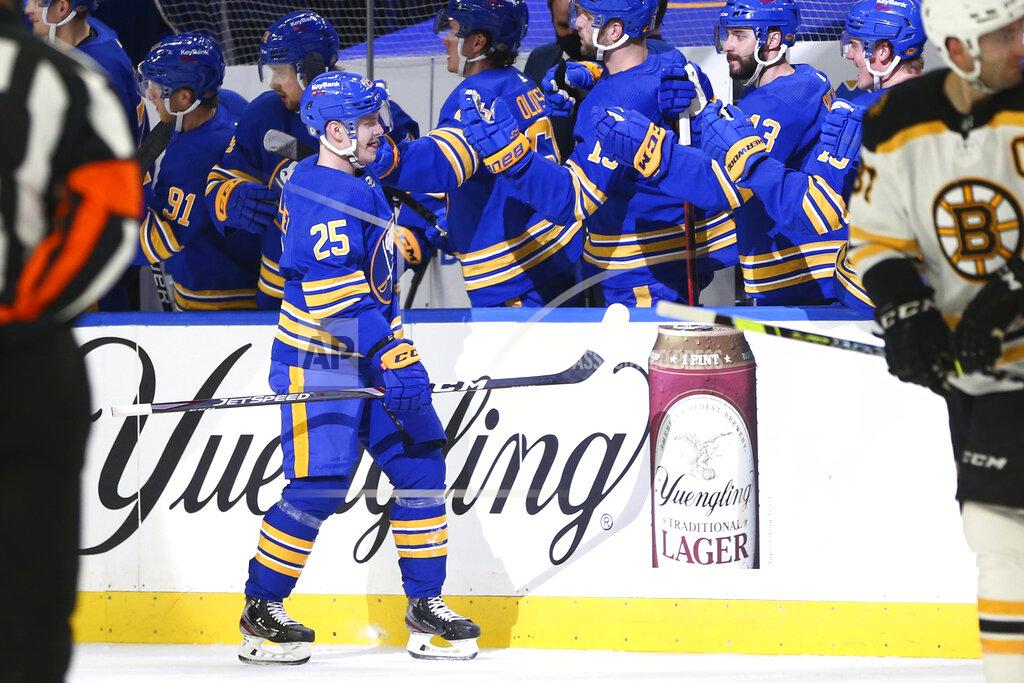 Jeffrey T. Barnes Buffalo Sabres forward Arttu Ruotsalainen (25) is congratulated after a goal during the second period of the team's NHL hockey game against the Boston Bruins, Thursday, April 22, 2021, in Buffalo, N.Y. (AP Photo/Jeffrey T. Barnes)