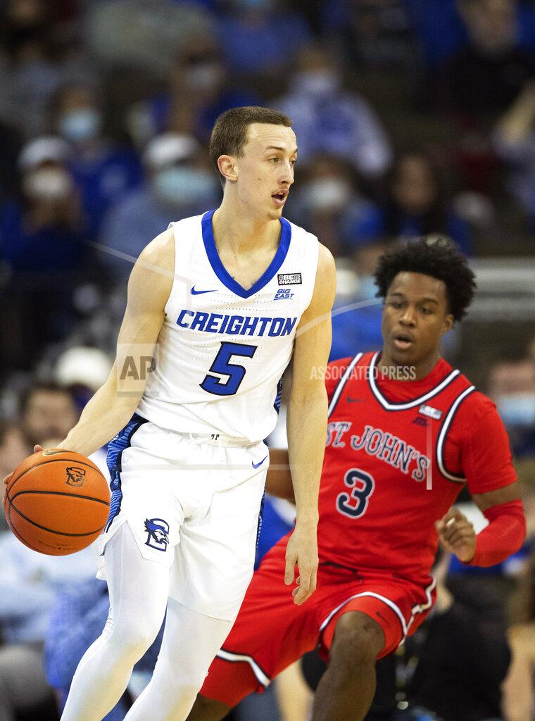 Rebecca S. Gratz Creighton's Alex O'Connell (5) plays against St. John's Stef Smith (3) during the second half of an NCAA college basketball game Wednesday, Jan. 19, 2022, in Omaha, Neb. O'Connell scored 28 points during the game, including 6 three point baskets. Creighton defeated St. John's 87-64. (AP Photo/Rebecca S. Gratz)