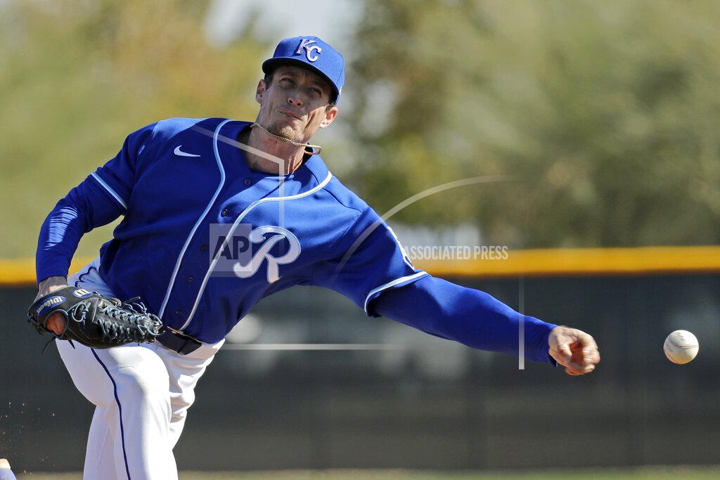 Charlie Riedel Kansas City Royals relief pitcher Tim Hill throws during baseball spring training Sunday, Feb. 16, 2020, in Surprise, Ariz. (AP Photo/Charlie Riedel)