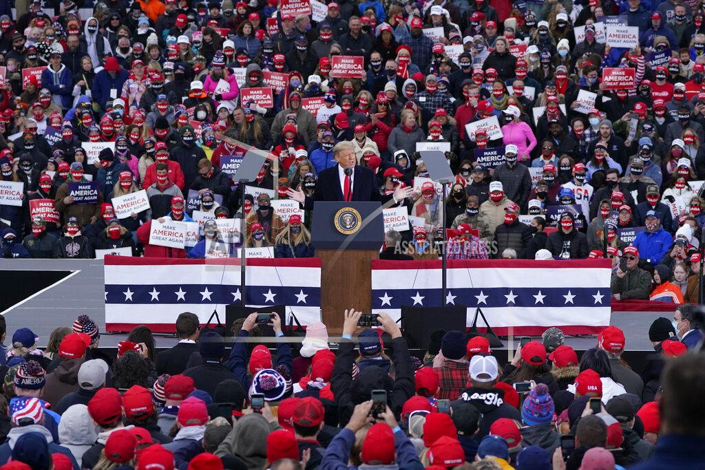 Carlos Osorio President Donald Trump speaks at a campaign rally, Saturday, Oct. 17, 2020, in Norton Shores, Mich. (AP Photo/Carlos Osorio)