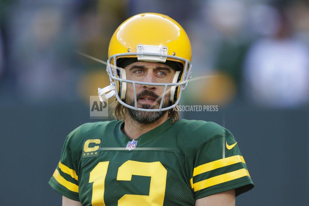 Matt Ludtke Green Bay Packers' Aaron Rodgers warms up before an NFL football game against the Washington Football Team Sunday, Oct. 24, 2021, in Green Bay, Wis. (AP Photo/Matt Ludtke)