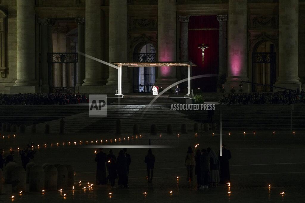 Angelo Carconi Pope Francis leads the Via Crucis (Way of the Cross) procession in the empty square outside the Saint Peter's Basilica during Good Friday celebrations at the Vatican, with no public participation due to the Coronavirus pandemic, Friday, April 2, 2021. (Angelo Carconi/Pool photo via AP)