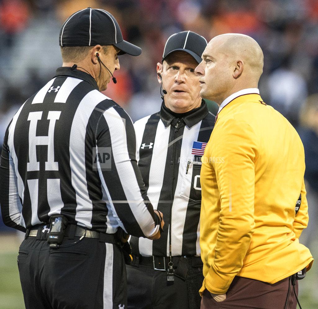 Holly Hart Minnesota head coach P.J. Fleck has a serious conversation with officials in the second half of a NCAA college football game against Illinois Saturday, Nov. 3, 2018, in Champaign, Ill. (AP Photo/Holly Hart)