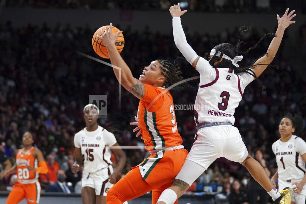 Sean Rayford Miami forward Destiny Harden (3) catches a pass against South Carolina guard Destanni Henderson (3) during the first half of a second-round game in the NCAA college basketball tournament, Sunday, March 20, 2022 in Columbia, S.C. (AP Photo/Sean Rayford)