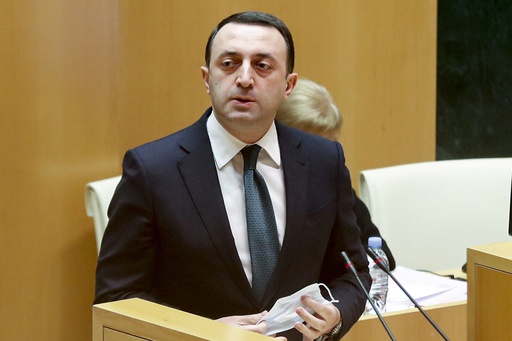 FILE Georgian Dream party Prime Irakli Garibashvili speaks at the Georgian Parliament in Tbilisi, Georgia, Monday, Feb. 22, 2021. The prime minister of the country of Georgia resigned on Monday, Jan 29, 2024 and said he had accepted an offer to become chairman of the Georgian Dream ruling party ahead of national elections in the autumn. (AP Photo/Shakh Aivazov, File)