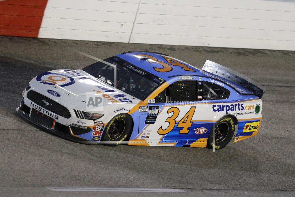 Brynn Anderson Michael McDowell (34) drives during the NASCAR Cup Series auto race Wednesday, May 20, 2020, in Darlington, S.C. (AP Photo/Brynn Anderson)