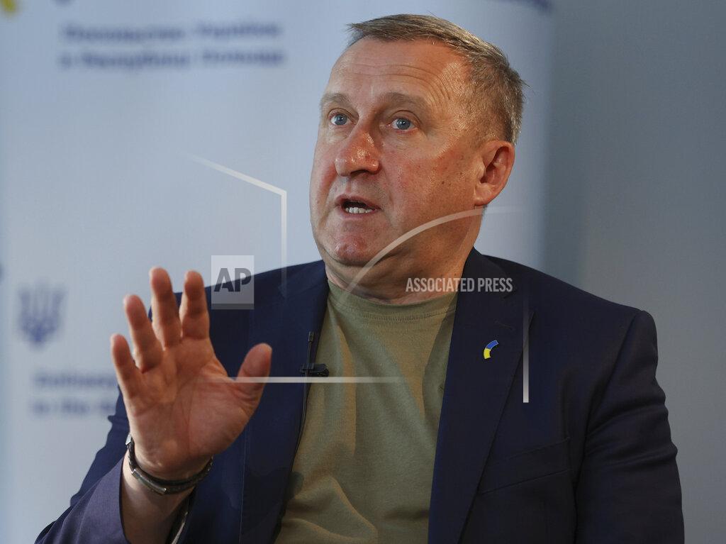 Michal Dyjuk Ukrainian Ambassador to Poland, Andrii Deshchytsia, speaks during an interview with The Associated Press in Warsaw, Poland, Friday, May 20, 2022. Ukraine's ambassador to neighboring Poland says his country is grateful for the welcome that Poles have given to millions of Ukrainians, but hopes the European Union will soon release billions of euros to Poland so that helping those fleeing the war does not come “at the cost of the Polish people.” Ambassador Andrii Deshchytsia said that while there have been no real social tensions in the three months since Ukrainians began crossing into Poland seeking safety, he worries they could appear in the future given how much Poland has done. (AP Photo/Michal Dyjuk)