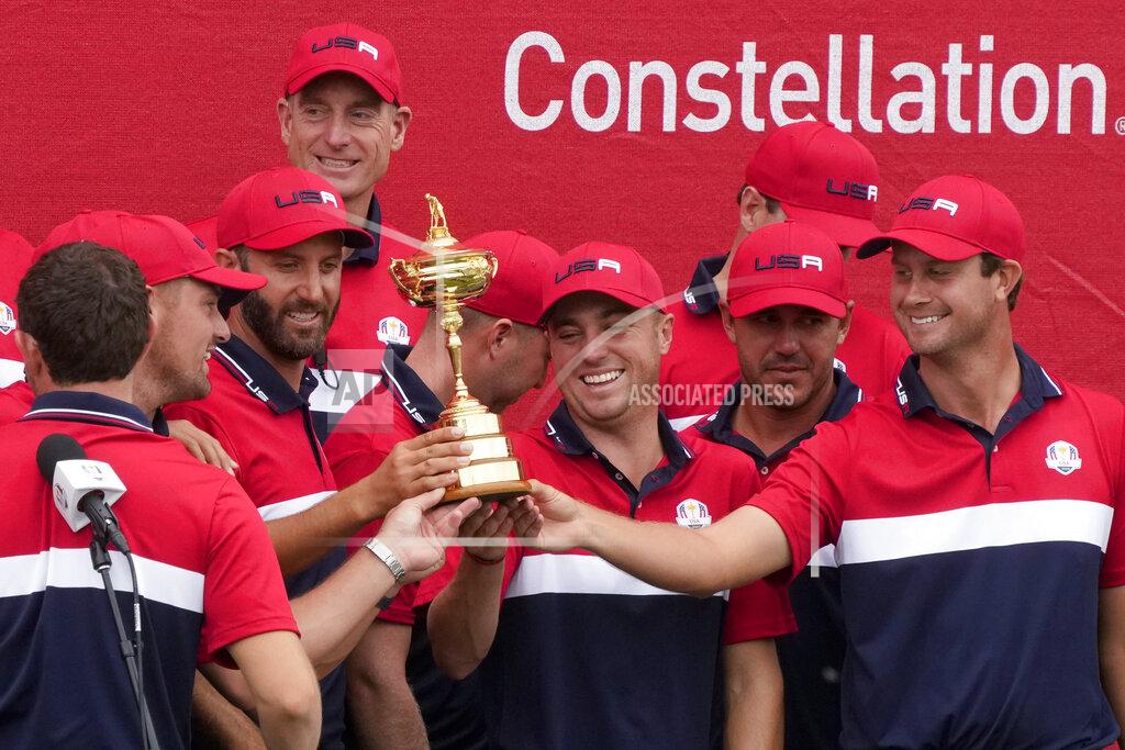 Charlie Neibergall Team USA holds the trophy after the Ryder Cup matches at the Whistling Straits Golf Course Sunday, Sept. 26, 2021, in Sheboygan, Wis. (AP Photo/Charlie Neibergall)