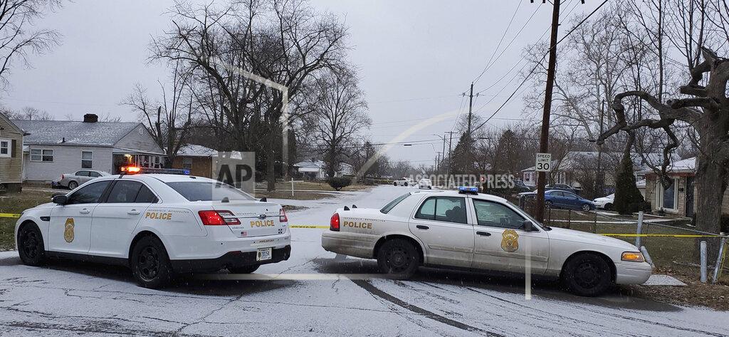 Justin L. Mack Indianapolis Metropolitan Police Department work the scene Sunday, Jan. 24, 2021 in Indianapolis where five people, including a pregnant woman, were shot to death early Sunday inside an Indianapolis home. The pregnant woman who was taken to an area hospital, both she and the unborn child died despite life-saving efforts. (Justin L. Mack/The Indianapolis Star via AP)