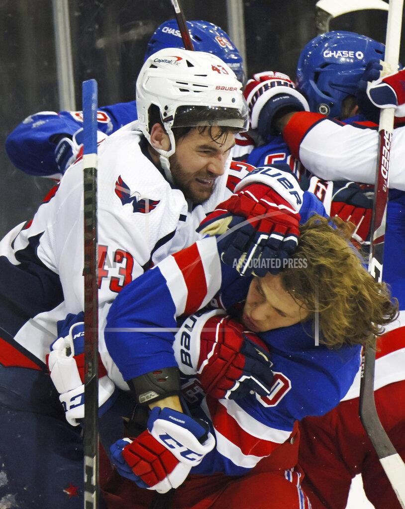 Bruce Bennett Washington Capitals' Tom Wilson (43) takes a roughing penalty during the second period against New York Rangers' Artemi Panarin (10) in an NHL hockey game Monday, May 3, 2021, in New York. (Bruce Bennett/Pool Photo via AP)