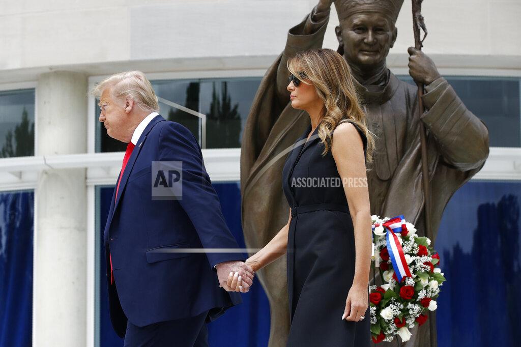 Patrick Semansky President Donald Trump and first lady Melania Trump depart after visiting Saint John Paul II National Shrine, Tuesday, June 2, 2020, in Washington. (AP Photo/Patrick Semansky)