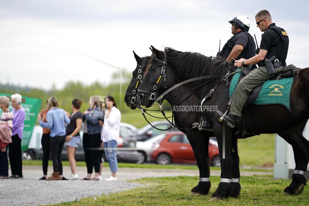 Mark Humphrey FILE -Officers on horseback guard the entrance to designated demonstrator areas near Riverbend Maximum Security Institution as people wait to enter before the scheduled execution of inmate Oscar Smith, Thursday, April 21, 2022, in Nashville, Tenn. Newly released records show at two least two people connected to a planned Tennessee execution that was abruptly put on hold April 21 knew the night before that the lethal injection drugs the state planned to use hadn’t undergone certain required testing. Last month, Gov. Bill Lee abruptly halted inmate Oscar Smith’s execution, citing an “oversight” in the execution process. (AP Photo/Mark Humphrey, File)