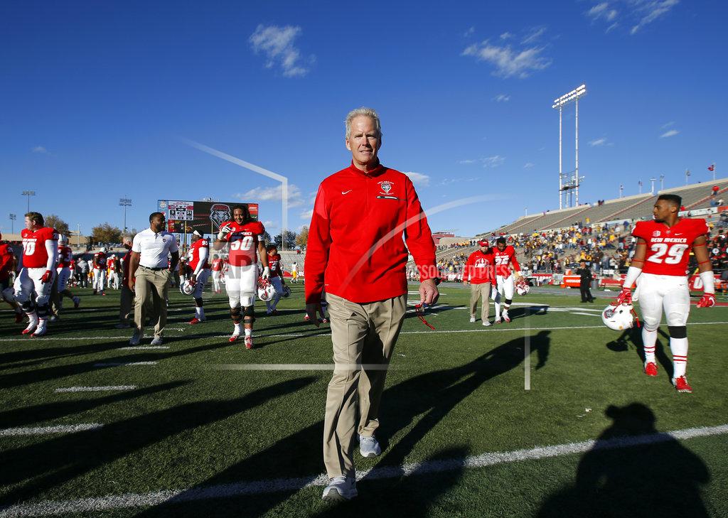 Andres Leighton New Mexico coach Bob Davie walks off the field after the NCAA college football game against Wyoming in Albuquerque, N.M., Saturday, Nov. 24, 2018. Wyoming won 31-3. (AP Photo/Andres Leighton)