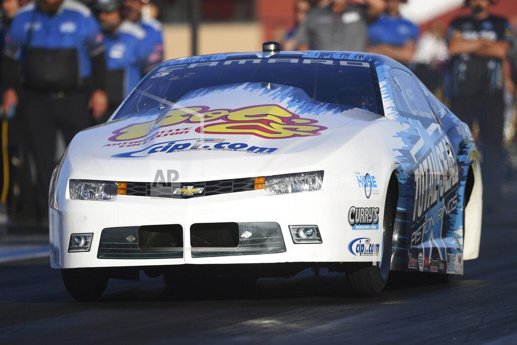 Marc Gewertz In this photo provided by the NHRA, Matt Hartford drives in Pro Stock qualifying Friday, July 23, 2021, at the NHRA Sonoma Nationals drag races in Sonoma, Calif. (Marc Gewertz/NHRA via AP)
