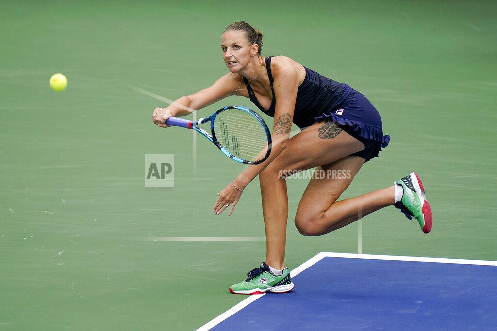Seth Wenig Karolina Pliskova, of the Czech Republic, returns a shot to Caroline Garcia, of France, during the second round of the US Open tennis championships, Wednesday, Sept. 2, 2020, in New York. (AP Photo/Seth Wenig)