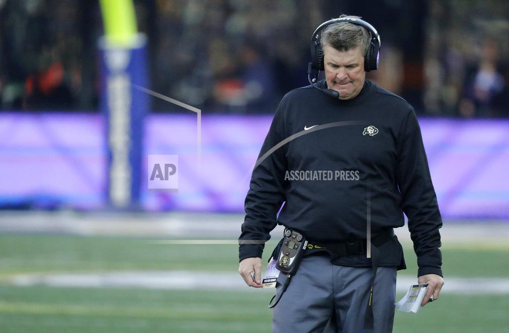 Ted S. Warren Colorado head coach Mike MacIntyre walks on the sideline during the second half of an NCAA college football game against Washington, Saturday, Oct. 20, 2018, in Seattle. Washington won 27-13. (AP Photo/Ted S. Warren)