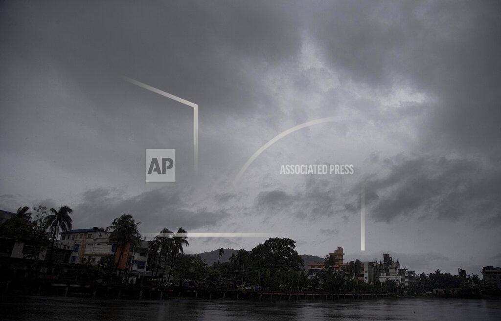Anupam Nath Clouds surrounded in the middle of heavy wind and rain in Gauhati, India, Thursday, May 21, 2020. A powerful cyclone ripped through densely populated coastal India and Bangladesh, blowing off roofs and whipping up waves that swallowed embankments and bridges and left entire villages without access to fresh water, electricity and communications. (AP Photo/Anupam Nath)