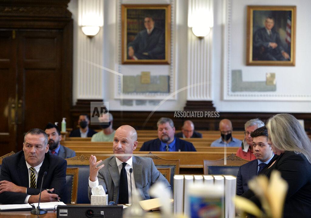Sean Krajacic yle Rittenhouse, second from right, appears in court with his legal team for a motion hearing in Kenosha, Wis., on Friday, Sept. 17, 2021. Rittenhouse traveled from his home in Antioch, Ill., about 20 miles (32 kilometers) to Kenosha on Aug. 25, 2020, after seeing a post on social media for militia to protect businesses. Rittenhouse faces multiple charges in the August 2020 shootings in Kenosha. (Sean Krajacic/The Kenosha News via AP)