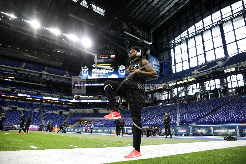 Charlie Neibergall Utah defensive back Jaylon Johnson stretches at the NFL football scouting combine in Indianapolis, Sunday, March 1, 2020. (AP Photo/Charlie Neibergall)