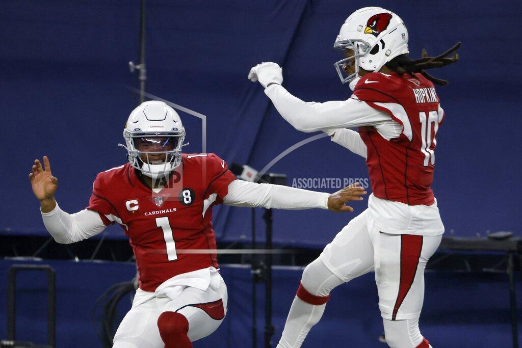 Ron Jenkins Arizona Cardinals' Kyler Murray (1) and DeAndre Hopkins (10) celebrate a touchdown scored on a carry by Murray in the second half of an NFL football game against the Dallas Cowboys in Arlington, Texas, Monday, Oct. 19, 2020. (AP Photo/Ron Jenkins)