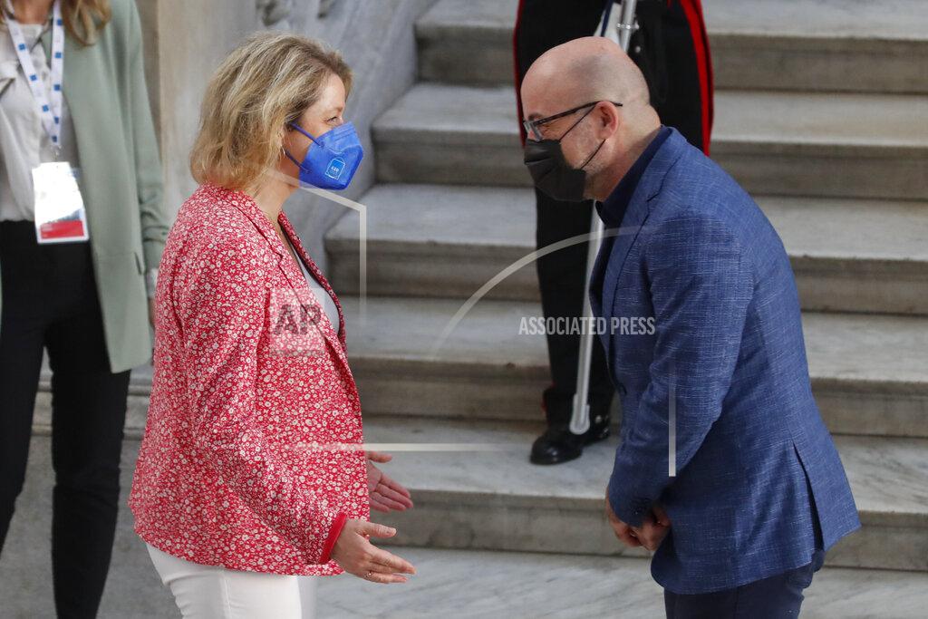 Salvatore Laporta Italian Minister for Ecological Transition Roberto Cingolani, right, welcomes welcomes his French homologue Barbara Pompili as she arrives at Palazzo Reale in Naples, Italy, Thursday, July 22, 2021, to take part in a G20 meeting on environment, climate and energy. (AP Photo/Salvatore Laporta)