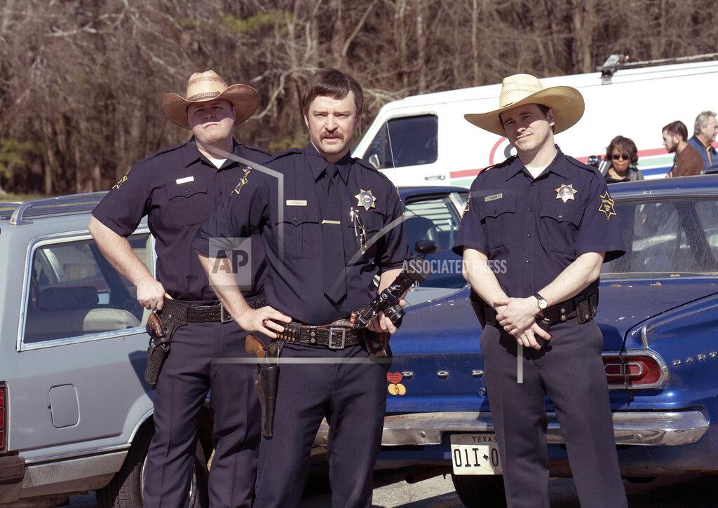 Tina Rowden This image released by Hulu shows, from left, Shaun Michael Lynch, Justin Timberlake and Jason Ritter in a scene from the series "Candy." (Hulu via AP)