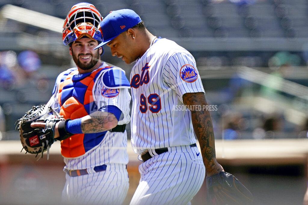Kathy Willens New York Mets catcher Tomas Nido, left, talks with Mets starting pitcher Taijuan Walker (99) during the Mets 7-1 victory over the Baltimore Orioles in a baseball game, Wednesday, May 12, 2021, in New York. (AP Photo/Kathy Willens)