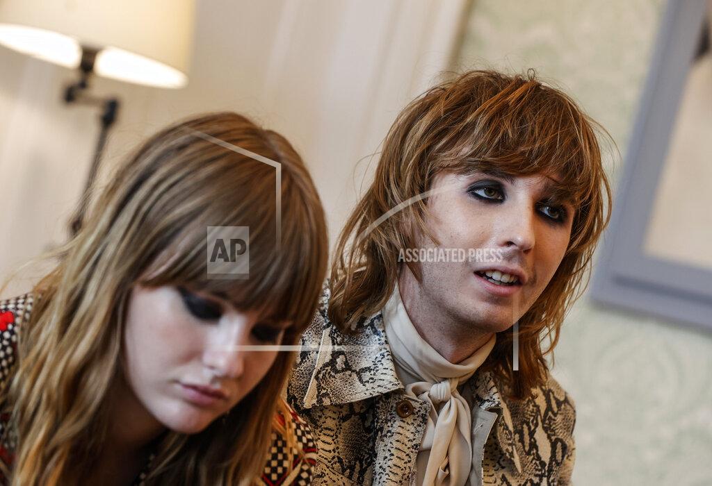 Riccardo De Luca Bass player Victoria De Angelis, left, and guitarist Thomas Raggi, of the Italian band Maneskin, winners of the Eurovision Song Contest in May, attend an interview with the Associated Press at a hotel in Rome, Tuesday, July 27, 2021. (AP Photo/Riccardo De Luca)