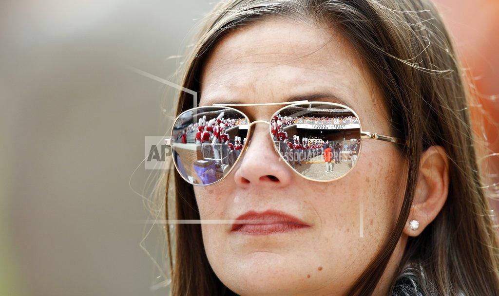 Wade Payne The Alabama band is reflected in the glasses of a fan before an NCAA college football game against Tennessee, Saturday, Oct. 20, 2018, in Knoxville, Tenn. (AP Photo/Wade Payne)