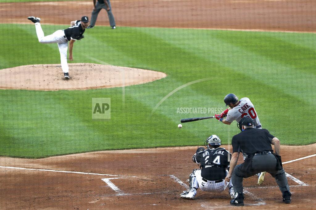 Charles Rex Arbogast Minnesota Twins' Jake Cave hits a two-run single off Chicago White Sox starting pitcher Lucas Giolito, during the first inning of a baseball game Friday, July 24, 2020, in Chicago. (AP Photo/Charles Rex Arbogast)
