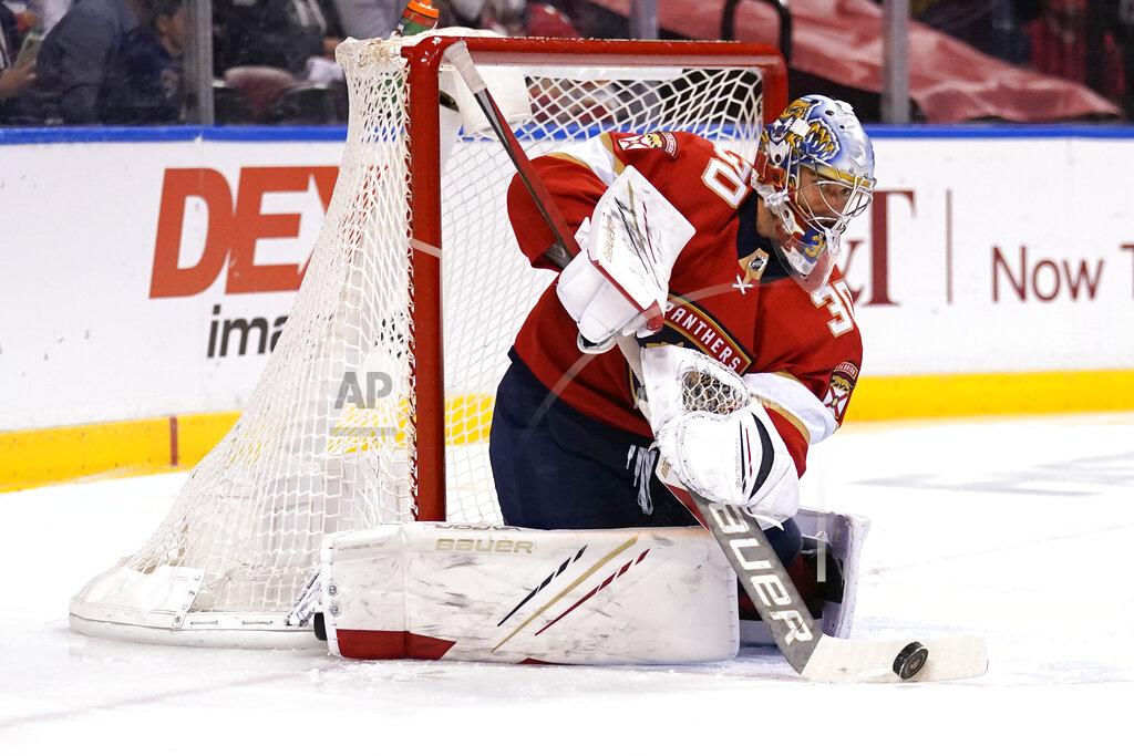 Lynne Sladky Florida Panthers goaltender Spencer Knight (30) stops a shot on the goal during the first period in Game 5 of an NHL hockey Stanley Cup first-round playoff series against the Tampa Bay Lightning, Monday, May 24, 2021, in Sunrise, Fla. (AP Photo/Lynne Sladky)