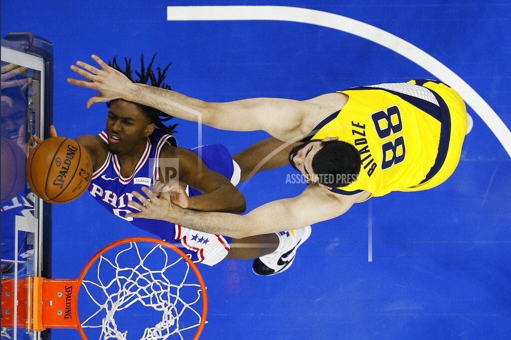 Matt Slocum Philadelphia 76ers' Tyrese Maxey, left, goes up for a shot against Indiana Pacers' Goga Bitadze during the first half of an NBA basketball game, Monday, March 1, 2021, in Philadelphia. (AP Photo/Matt Slocum)