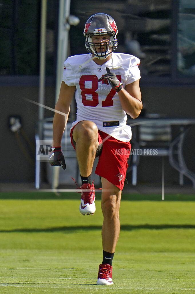 Tampa Bay Buccaneers tight end Rob Gronkowski (87) stretches during an NFL football minicamp Tuesday, June 8, 2021, in Tampa, Fla. (AP Photo/Chris O'Meara)