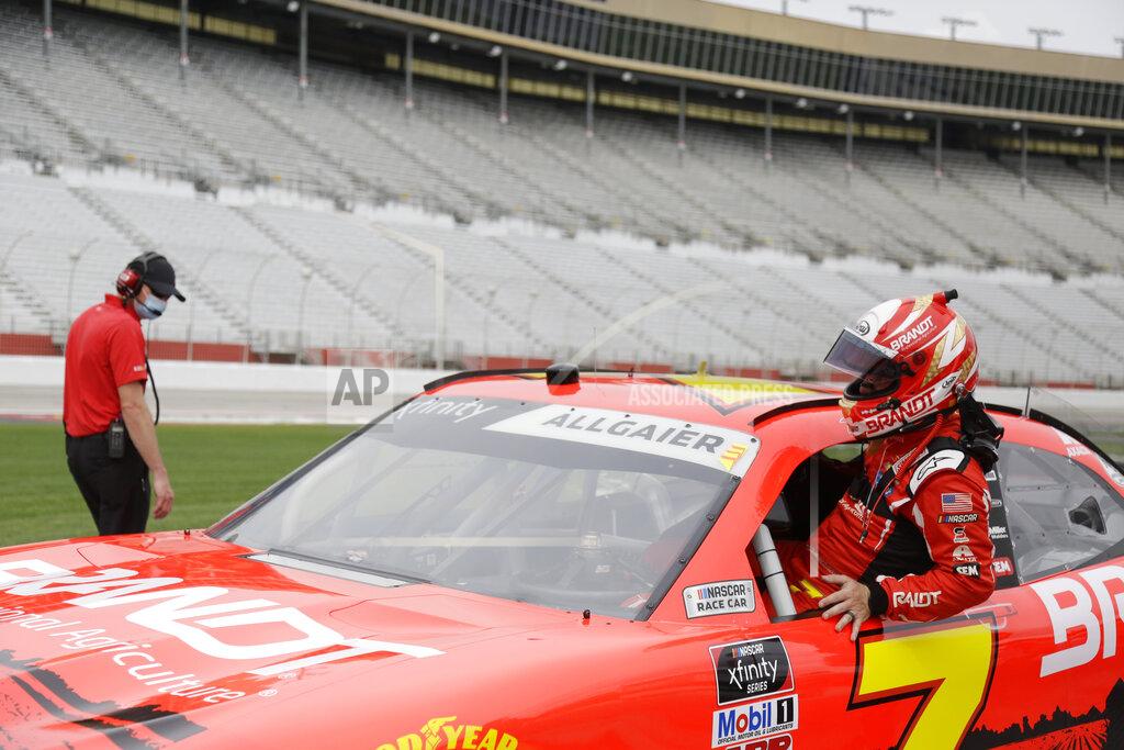 Brynn Anderson Justin Allgaier, right, gets into his car before a NASCAR Xfinity Series auto race at Atlanta Motor Speedway, Saturday, June 6, 2020, in Hampton, Ga. (AP Photo/Brynn Anderson)