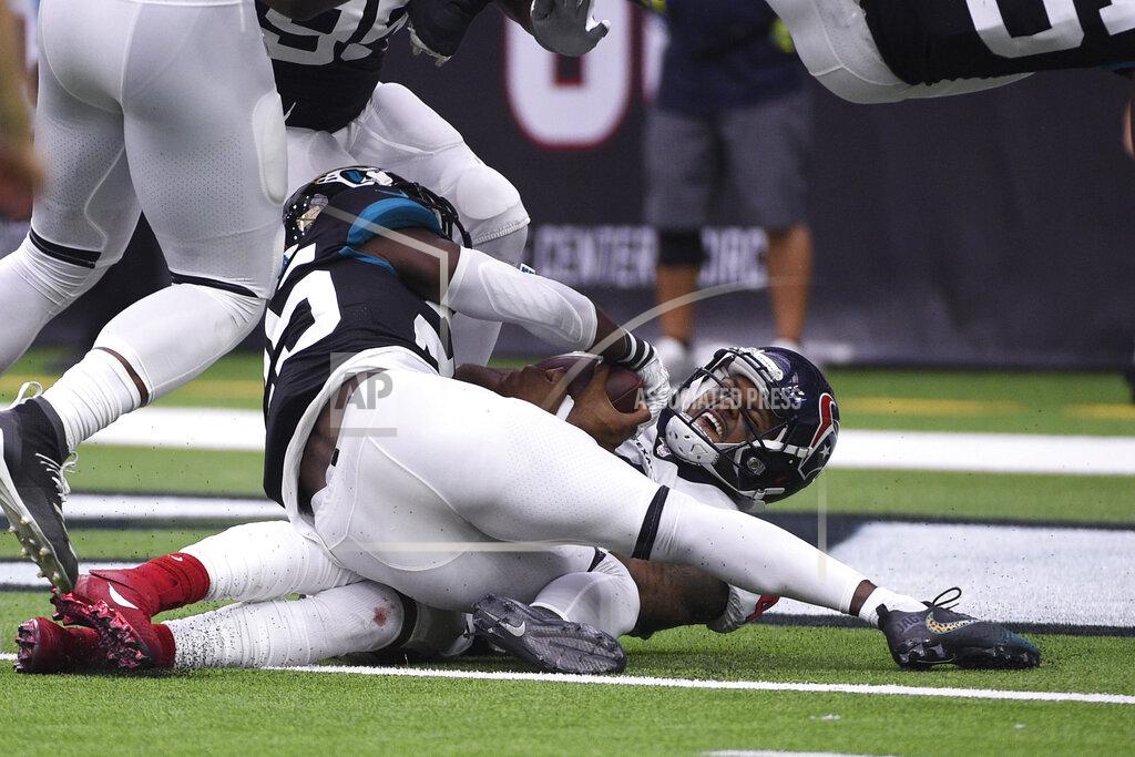 Eric Christian Smith Houston Texans quarterback Deshaun Watson (4) is hit by Jacksonville Jaguars defensive back D.J. Hayden (25) as he falls into the end zone for a touchdown during the second half of an NFL football game Sunday, Sept. 15, 2019, in Houston. (AP Photo/Eric Christian Smith)