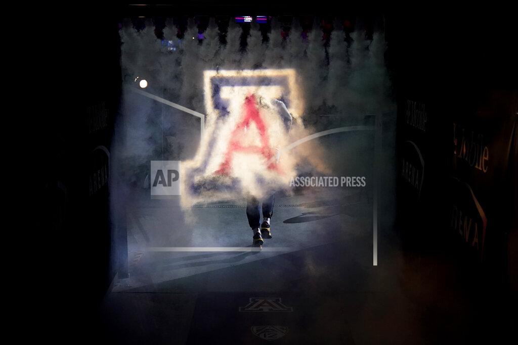 John Locher Arizona's Justin Kier (5) runs onto the court before an NCAA college basketball game against Colorado in the semifinal round of the Pac-12 tournament Friday, March 11, 2022, in Las Vegas. (AP Photo/John Locher)