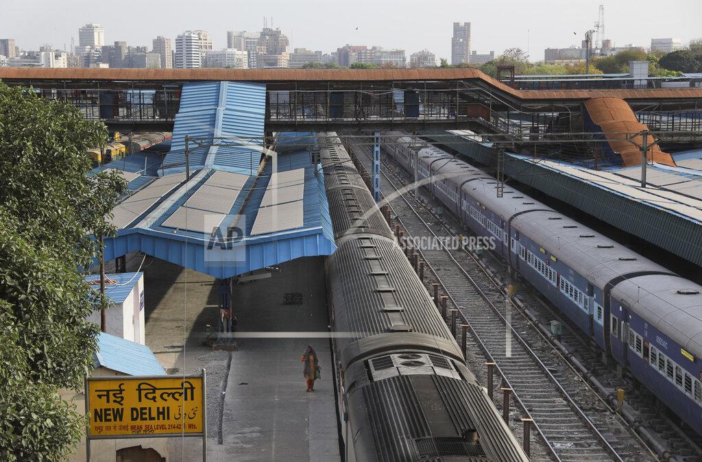 This March 23, 2020, photo shows a deserted New Delhi railway station during lockdown in India. India is set to re-open some parts of its colossal rail network on Tuesday, as the country looks at easing its nearly seven-week strict lockdown amid an increase in coronavirus infections. (AP Photo/Manish Swarup)