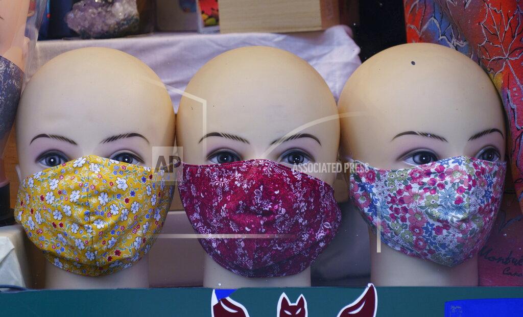 Face masks are on display in a store in Montreal, Monday, Sept. 28, 2020, during the coronavirus pandemic. (Paul Chiasson/The Canadian Press via AP)