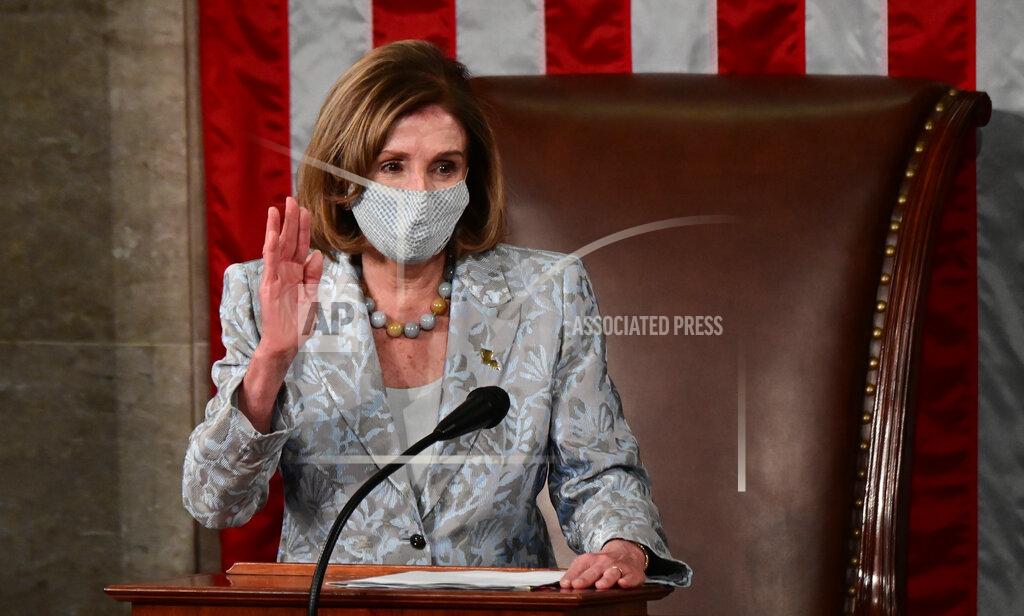 Erin Scott House Speaker Nancy Pelosi takes her oath of office as the Speaker of the 117th Congress after being re-elected at the U.S. Capitol in Washington, Sunday, Jan. 3, 2021. (Erin Scott/Pool via AP)