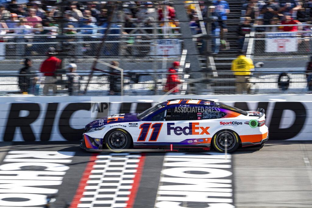 Mike Caudill Denny Hamlin drives during the NASCAR Cup Series auto race at Richmond Raceway on Sunday, April 3, 2022, in Richmond, Va. (AP Photo/Mike Caudill)