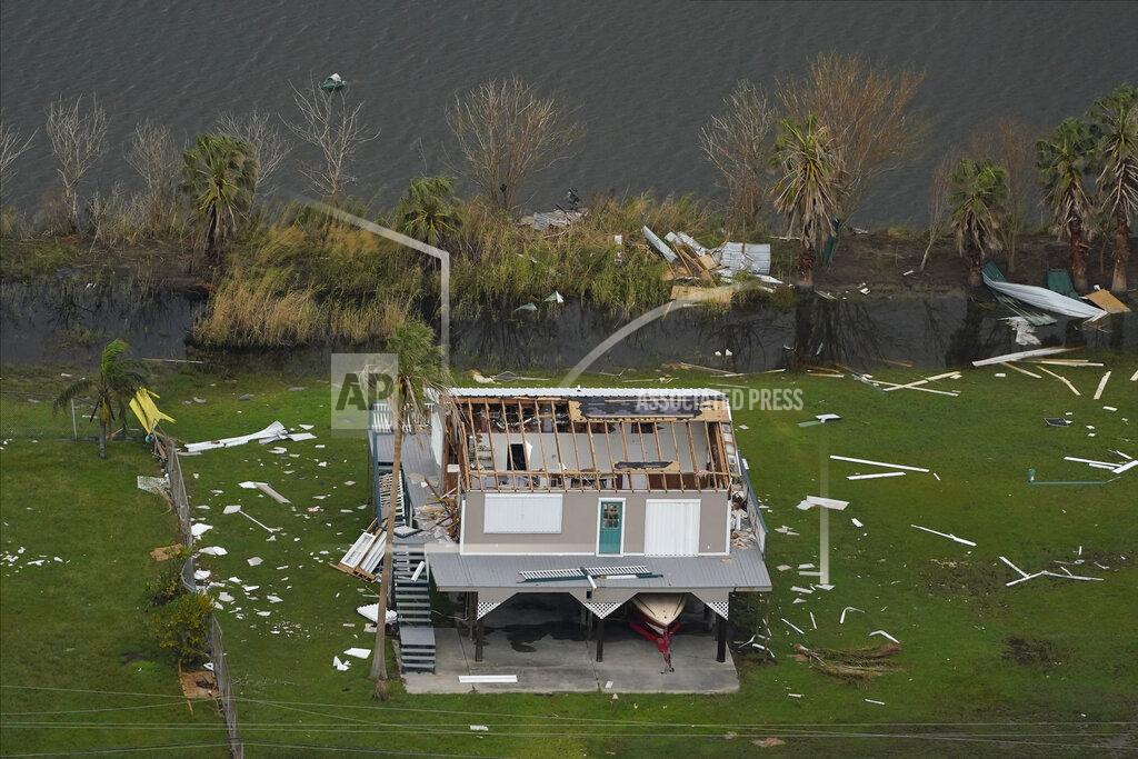 Matt Slocum In this aerial photo, the remains of a damaged home are seen in the aftermath of Hurricane Ida, Monday, Sept. 6, 2021, in Grand Isle, La. (AP Photo/Matt Slocum)