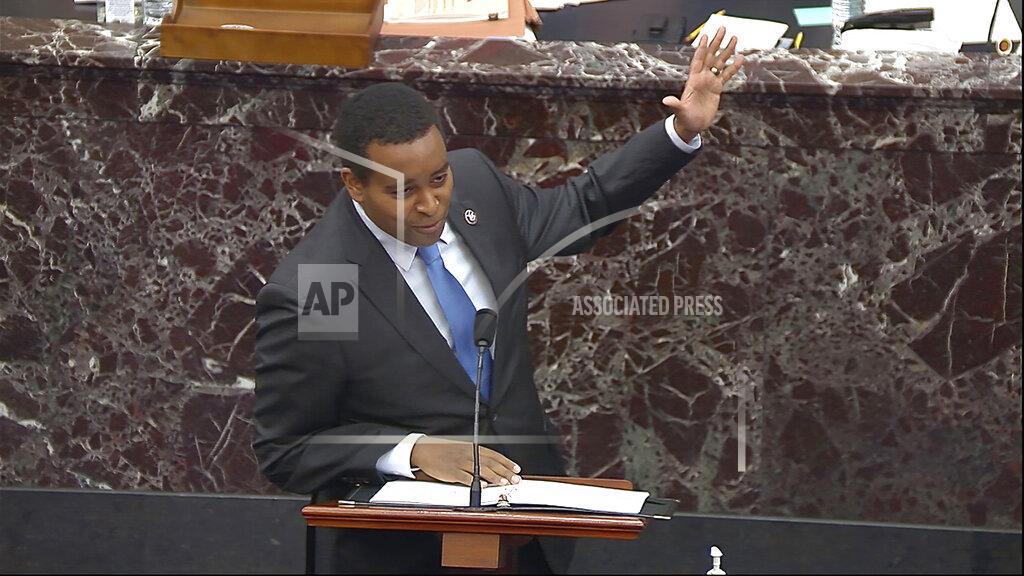 Uncredited In this image from video, House impeachment manager Rep. Joe Neguse, D-Colo., speaks during the second impeachment trial of former President Donald Trump in the Senate at the U.S. Capitol in Washington, Tuesday, Feb. 9, 2021. (Senate Television via AP)