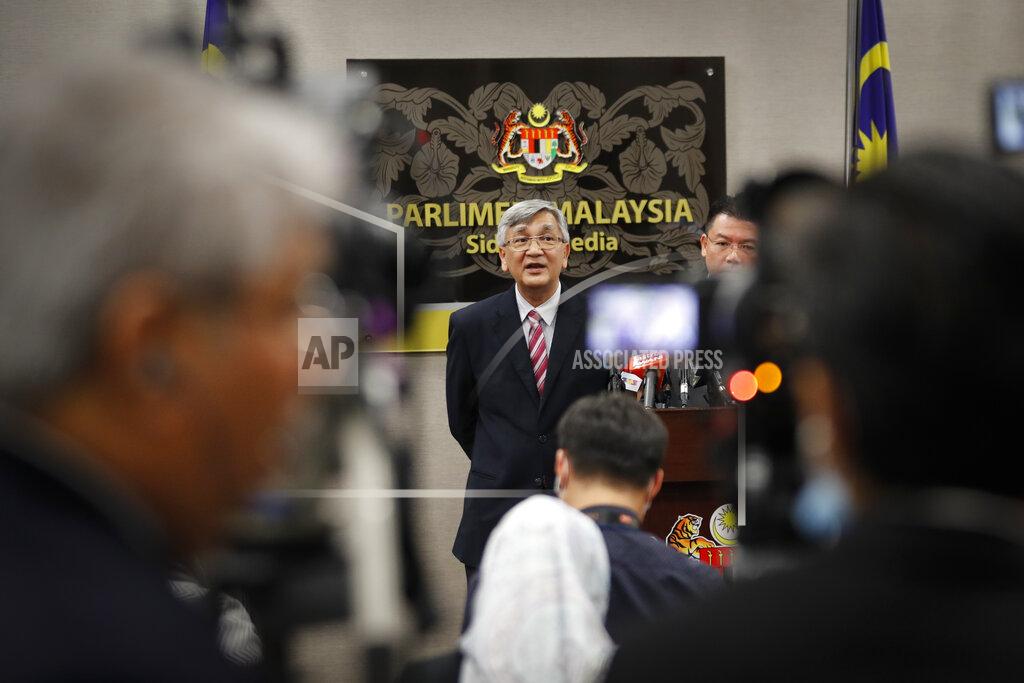 Vincent Thian Malaysia parliament lower house speaker Mohamad Ariff Md Yusof, speaks to media after a lower house vote on motions to appoint a new speaker during a parliament session in Kuala Lumpur, Malaysia, Monday, July 13, 2020. Malaysian new Prime Minister Muhyiddin Yassin narrowly won a motion to boot the parliament speaker Monday, scraping through the first test of his support nearly five months after he took power. (AP Photo/Vincent Thian)
