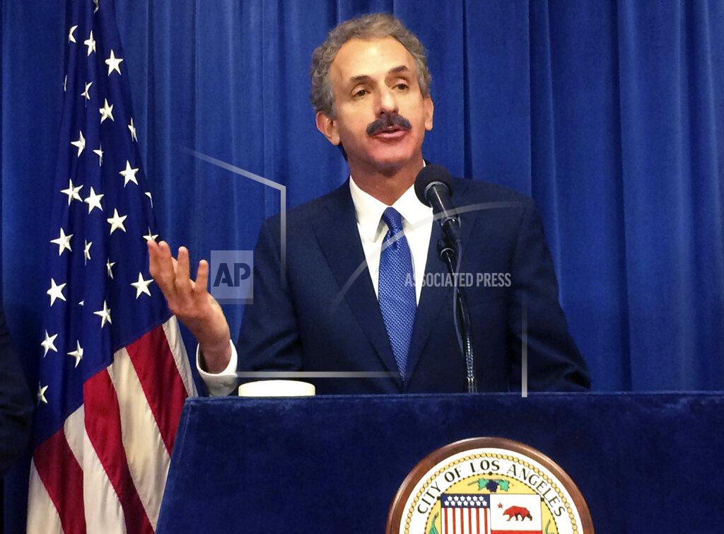 Christopher Weber FILE - In this June 20, 2017, file photo, Los Angeles City Attorney Mike Feuer talks during a news conference in Los Angeles. Feuer's office filed misdemeanor charges against TikTok celebrities Bryce Hall and Blake Gray after they hosted recent parties in the Hollywood Hills despite the city's ban on large gatherings during the coronavirus pandemic, authorities said Friday, Aug. 28, 2020. Feuer said he is not aware of any COVID-19 cases that have been linked to their parties. (AP Photo/Christopher Weber, File)